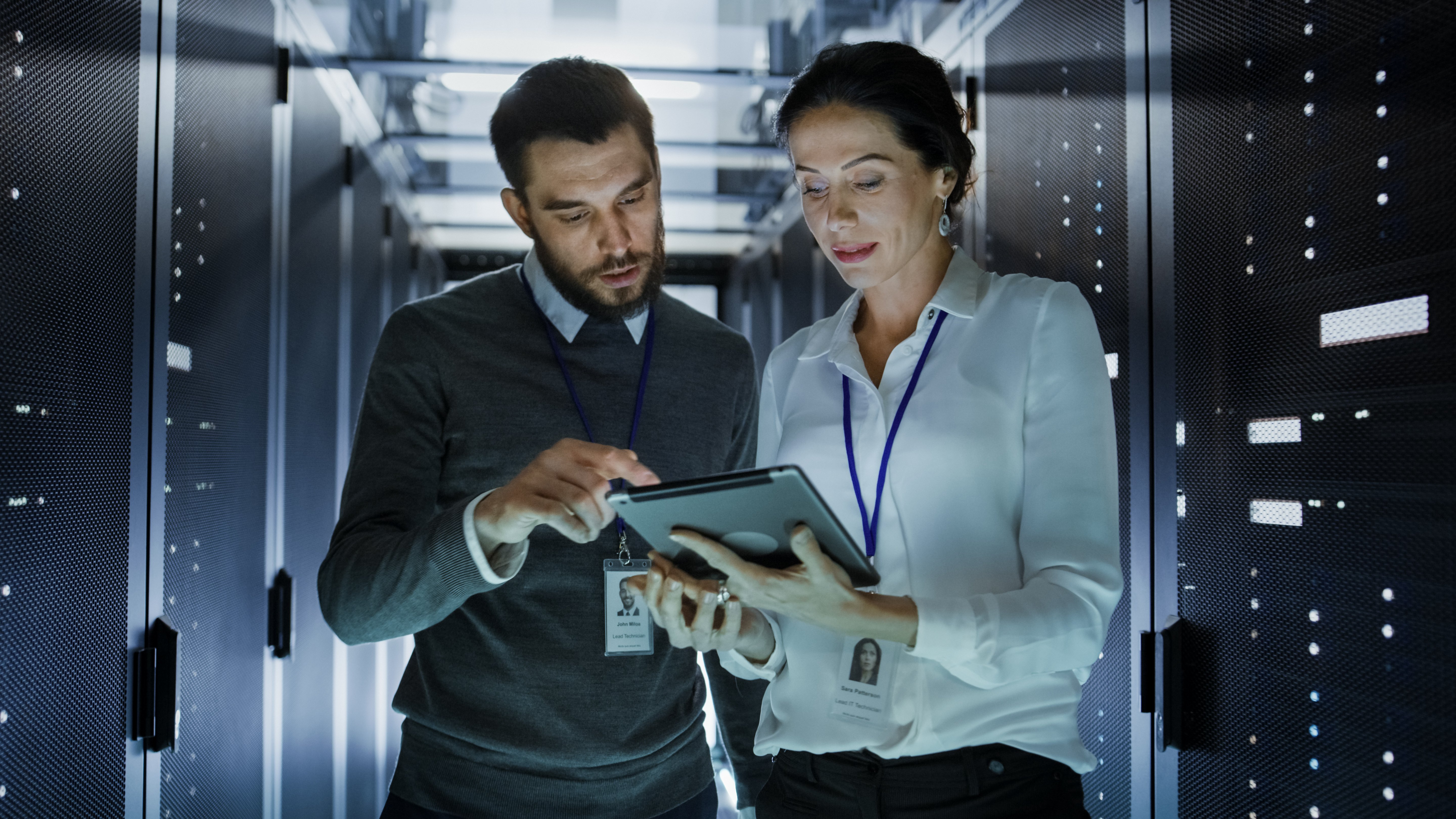 two-telecom-agents-in-server-room